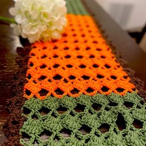 Crochet table runner, brown, gold, green, orange and beige tones
